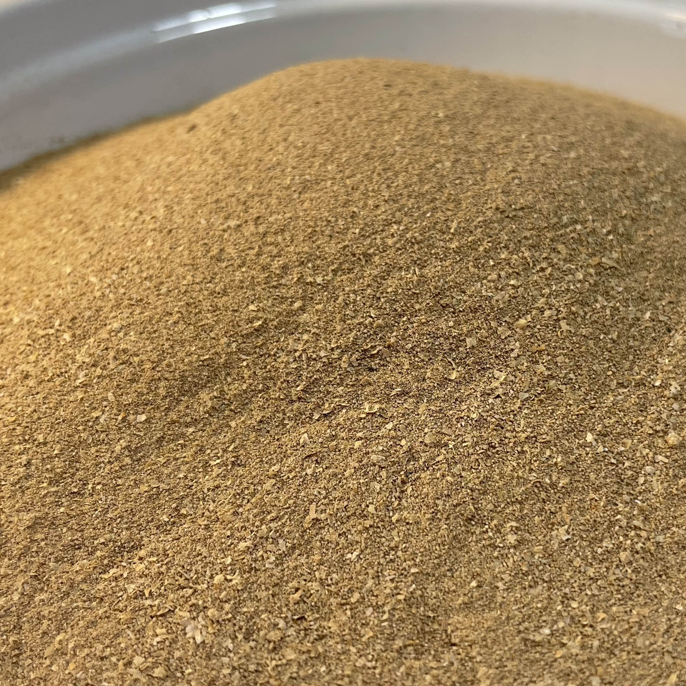 Close up photo of a bulk quantity of mealworm frass